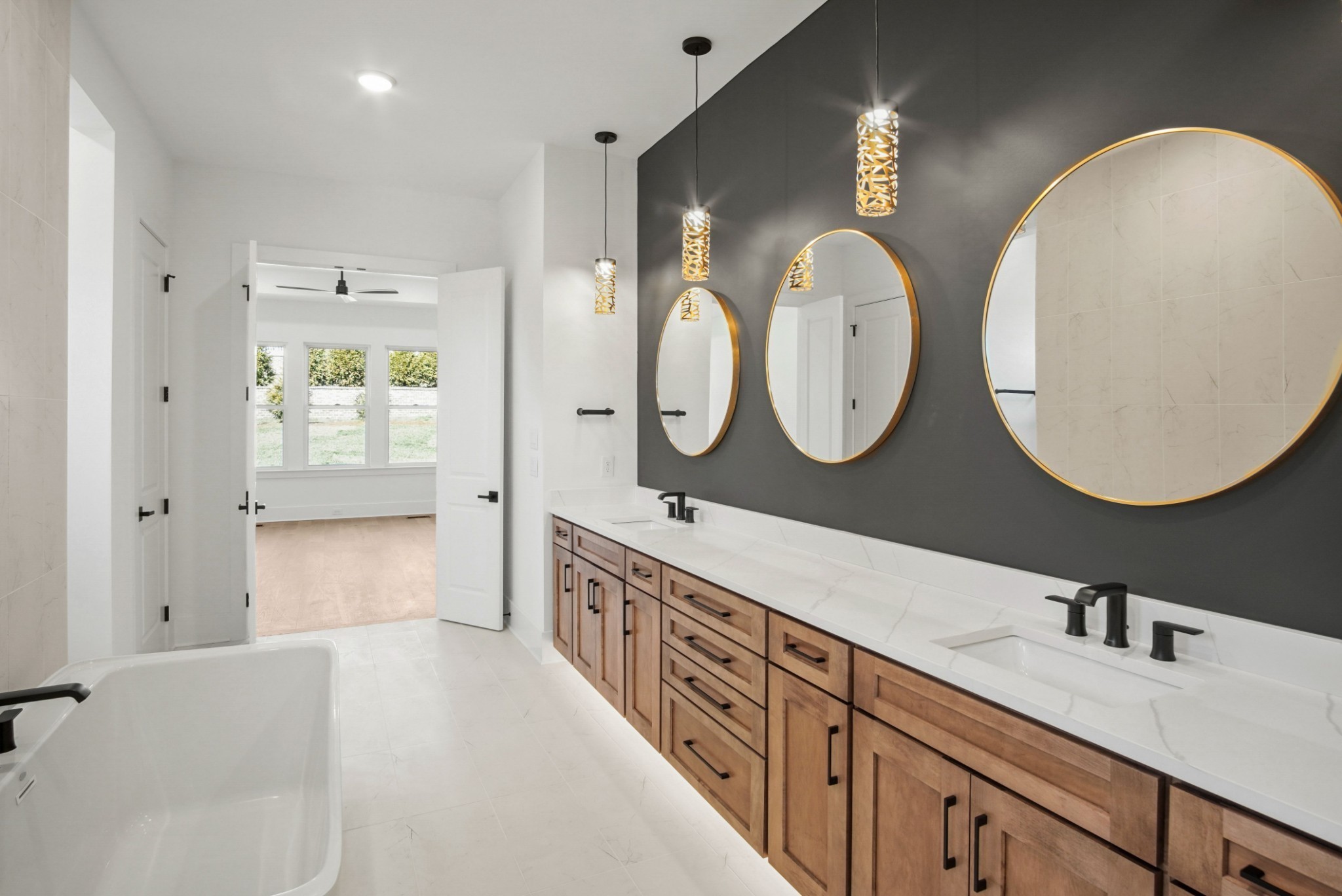 6029 Lookaway Circle Franklin, TN 37067 - Photo 40 of 64 a spacious bathroom with a double vanity sink and a mirror