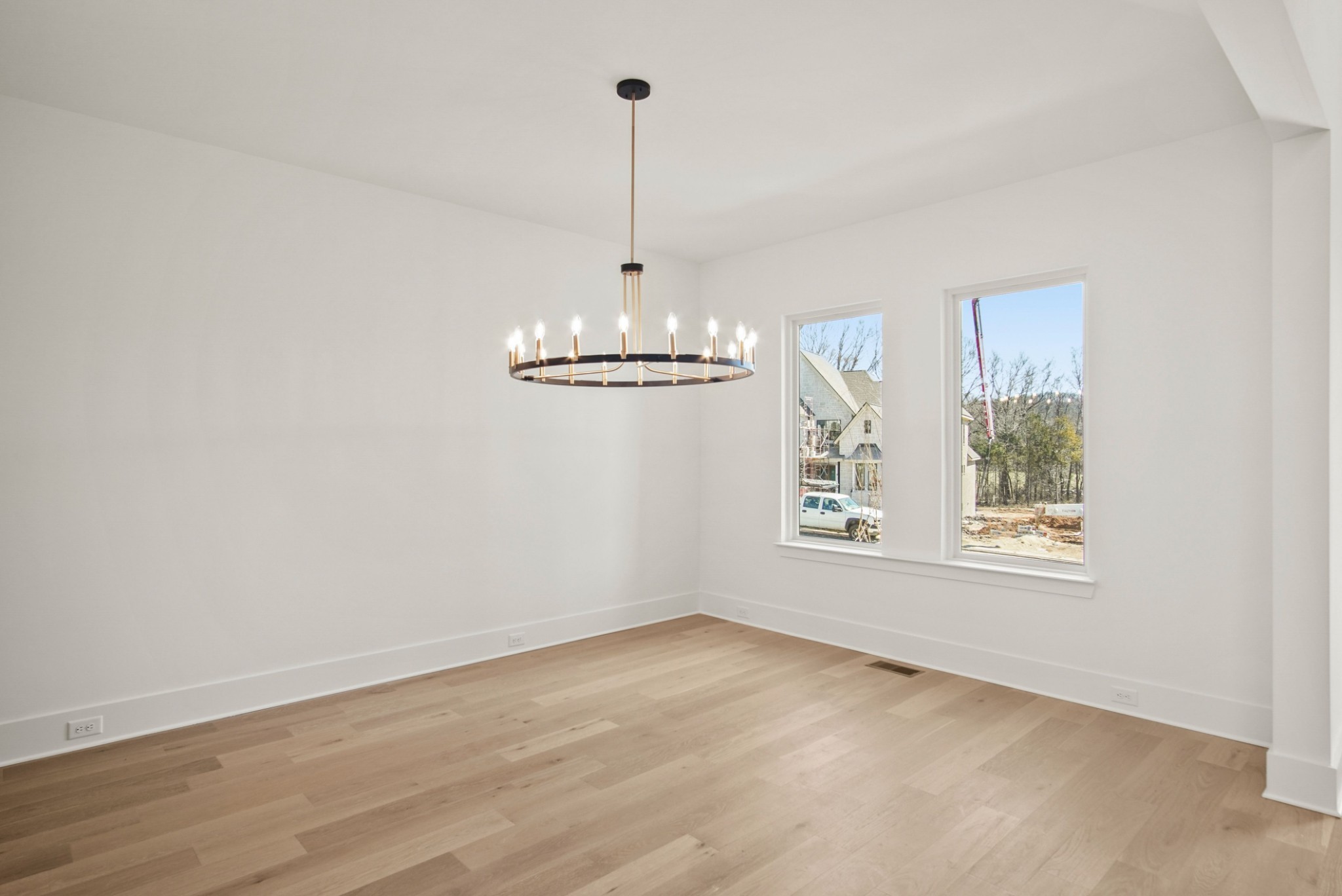 6029 Lookaway Circle Franklin, TN 37067 - Photo 10 of 64 a view of a room with window wooden floor and a ceiling fan