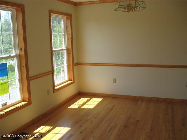 5791 Clover Road Long Pond, PA 18334 - Photo 7 of 8 a view of an empty room and window
