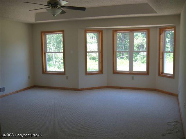 5791 Clover Road Long Pond, PA 18334 - Photo 8 of 8 an empty room with windows