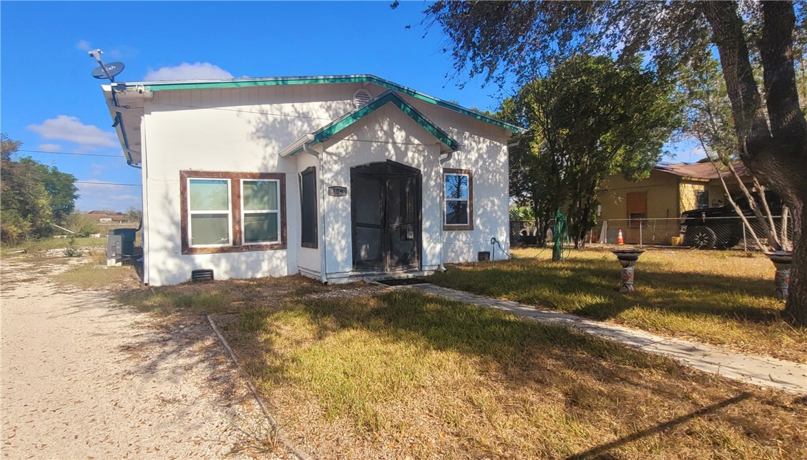 809 Hickey Street Alice, TX 78332 - Photo 2 of 13 a view of a house with snow on the wall