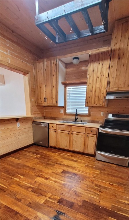 809 Hickey Street Alice, TX 78332 - Photo 6 of 13 a large kitchen with stainless steel appliances granite countertop a stove and a sink