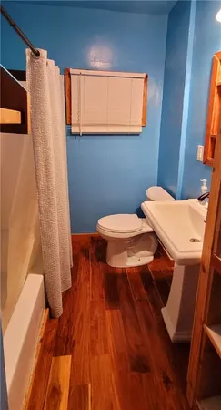 a bathroom with a sink and a toilet