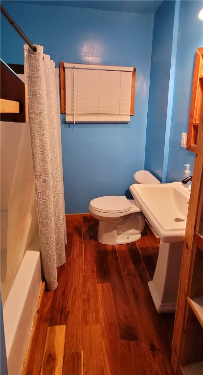 809 Hickey Street Alice, TX 78332 - Photo 10 of 13 a bathroom with a sink and a toilet