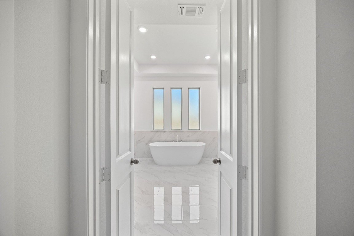 201 Buckaroo Drive Georgetown, TX 78633 - Photo 12 of 36 a bathroom with a sink