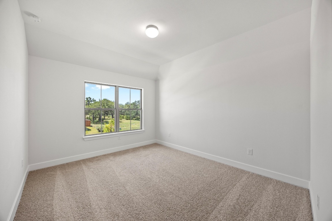 201 Buckaroo Drive Georgetown, TX 78633 - Photo 25 of 36 an empty room with windows