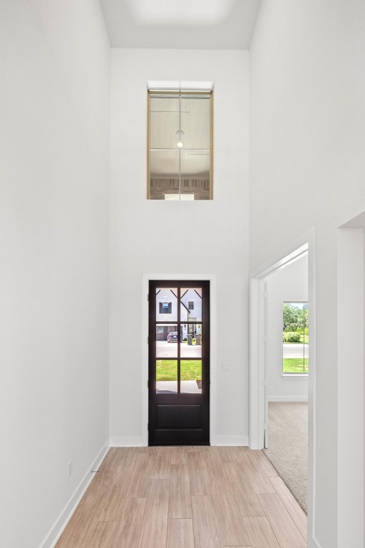 201 Buckaroo Drive Georgetown, TX 78633 - Photo 28 of 36 a view of an empty room with window and wooden floor