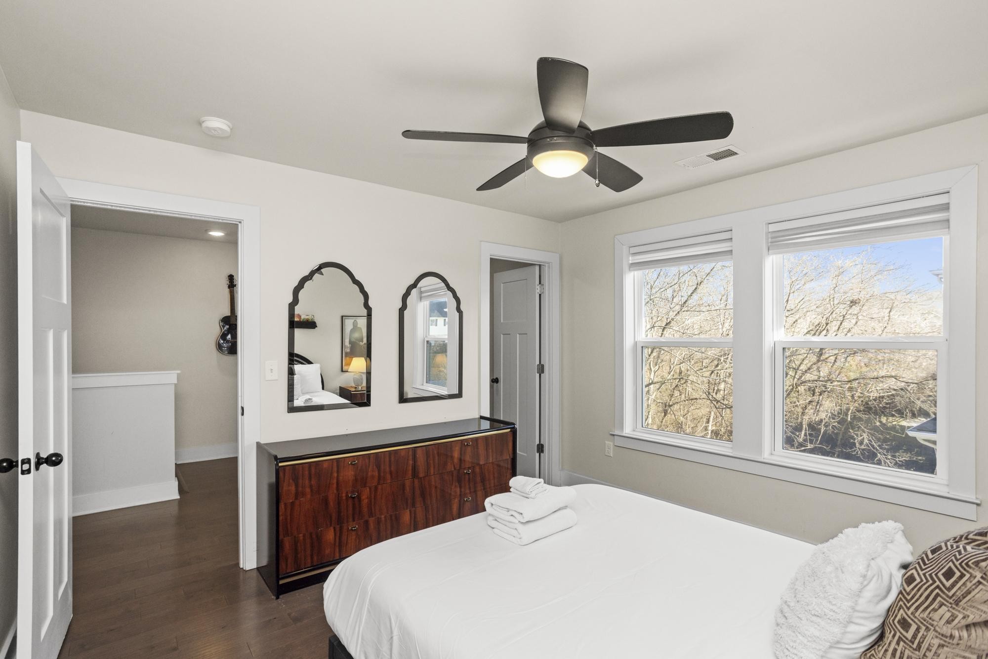 450 Glastonbury Road, Unit 3 Nashville, TN 37217 - Photo 13 of 43 a bedroom with a large bed and a window