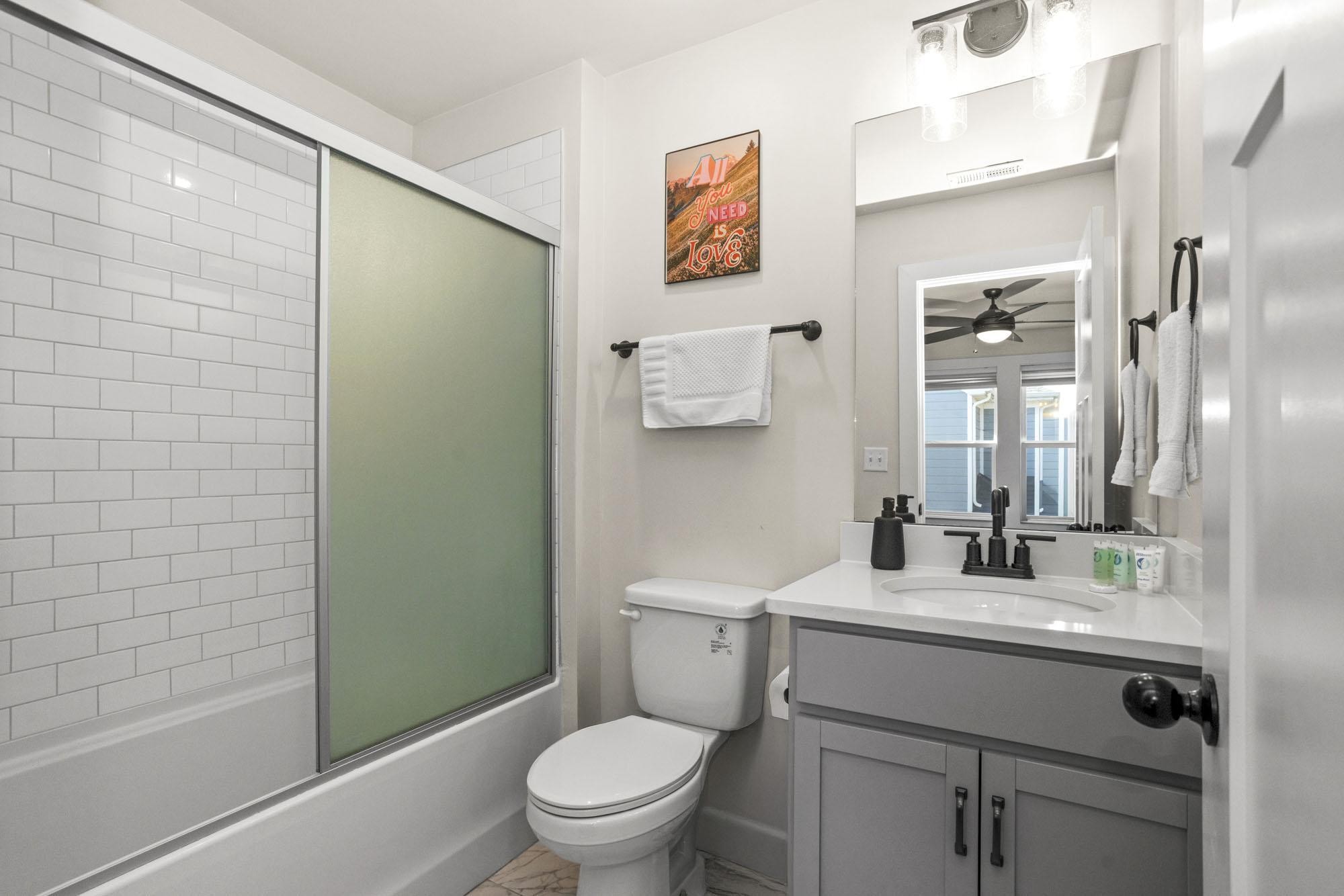 450 Glastonbury Road, Unit 3 Nashville, TN 37217 - Photo 14 of 43 a bathroom with a sink a toilet and shower