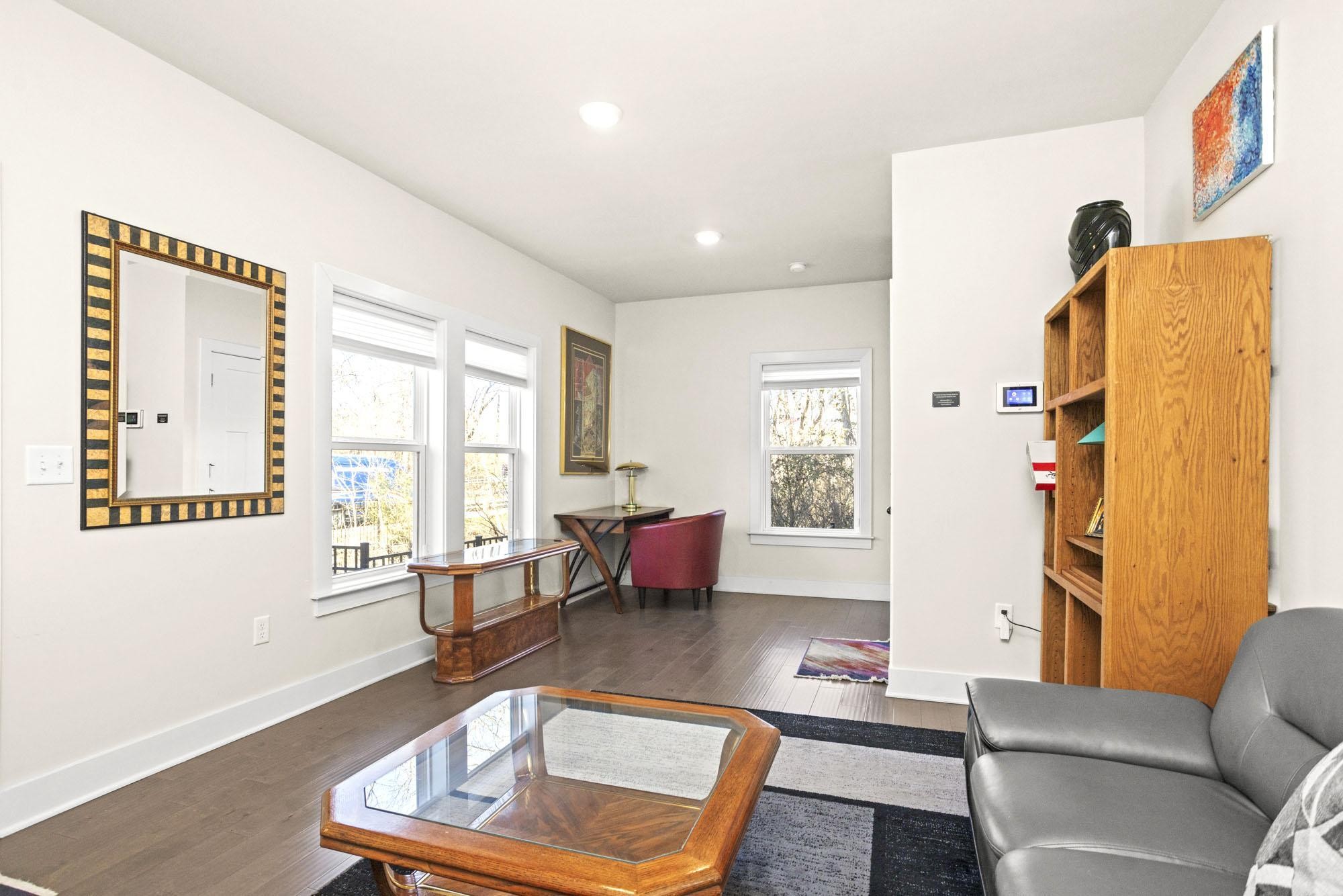 450 Glastonbury Road, Unit 3 Nashville, TN 37217 - Photo 2 of 43 a living room with furniture and a window