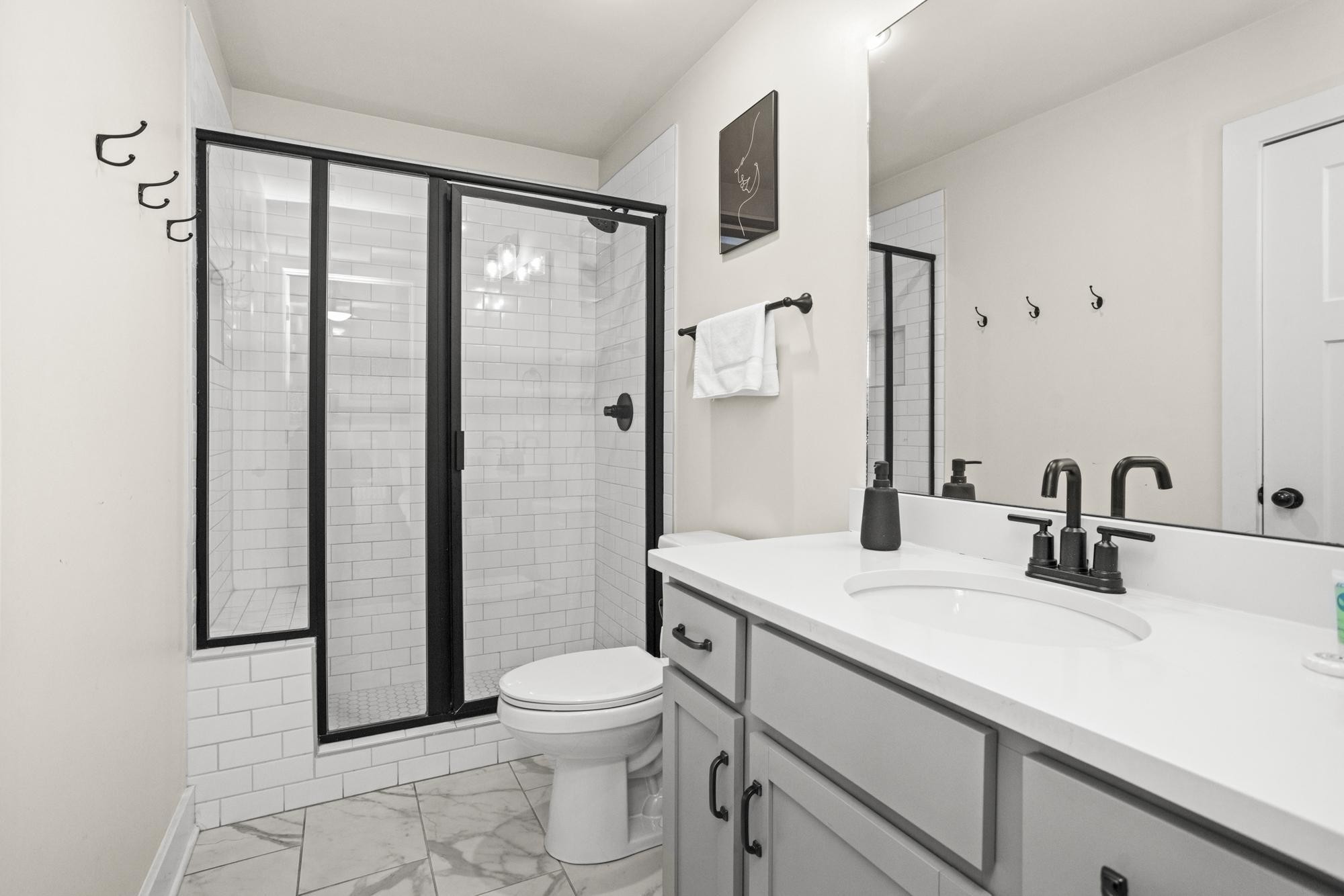 450 Glastonbury Road, Unit 3 Nashville, TN 37217 - Photo 21 of 43 a bathroom with a sink toilet and shower