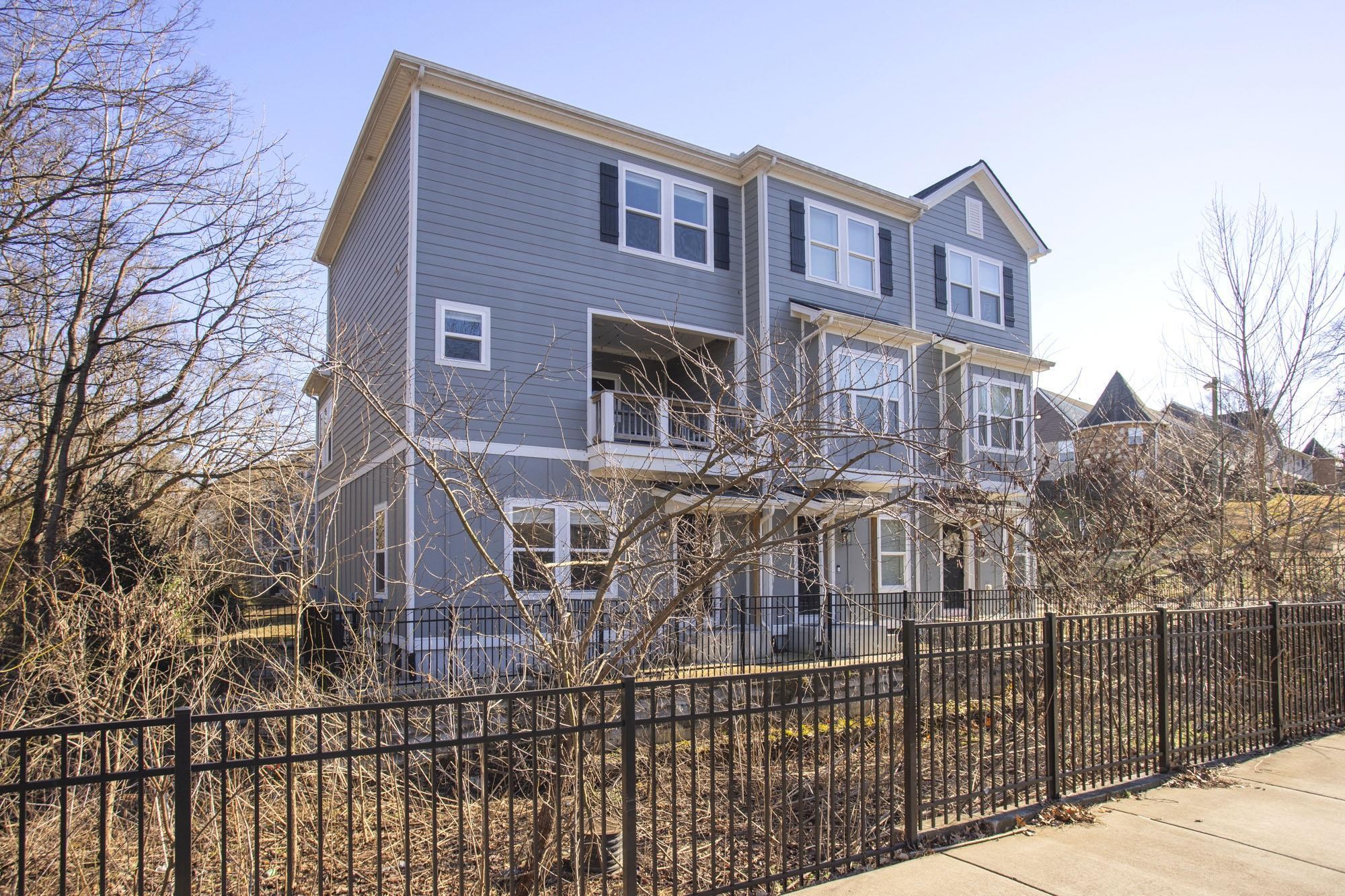 450 Glastonbury Road, Unit 3 Nashville, TN 37217 - Photo 42 of 43 a front view of a house with a yard