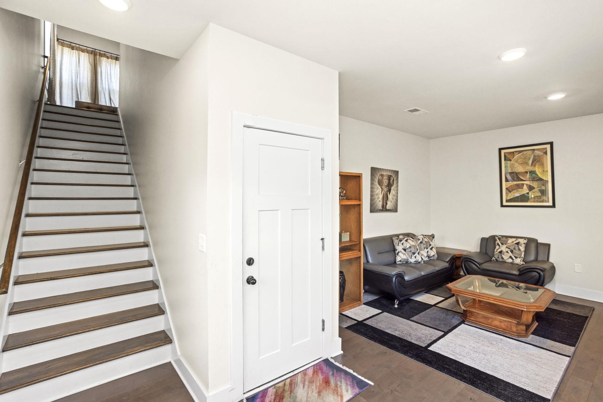 450 Glastonbury Road, Unit 3 Nashville, TN 37217 - Photo 6 of 43 a hallway with a workspace