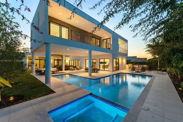 a view of a swimming pool with lounge chair