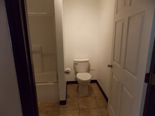 a bathroom with a toilet and a sink