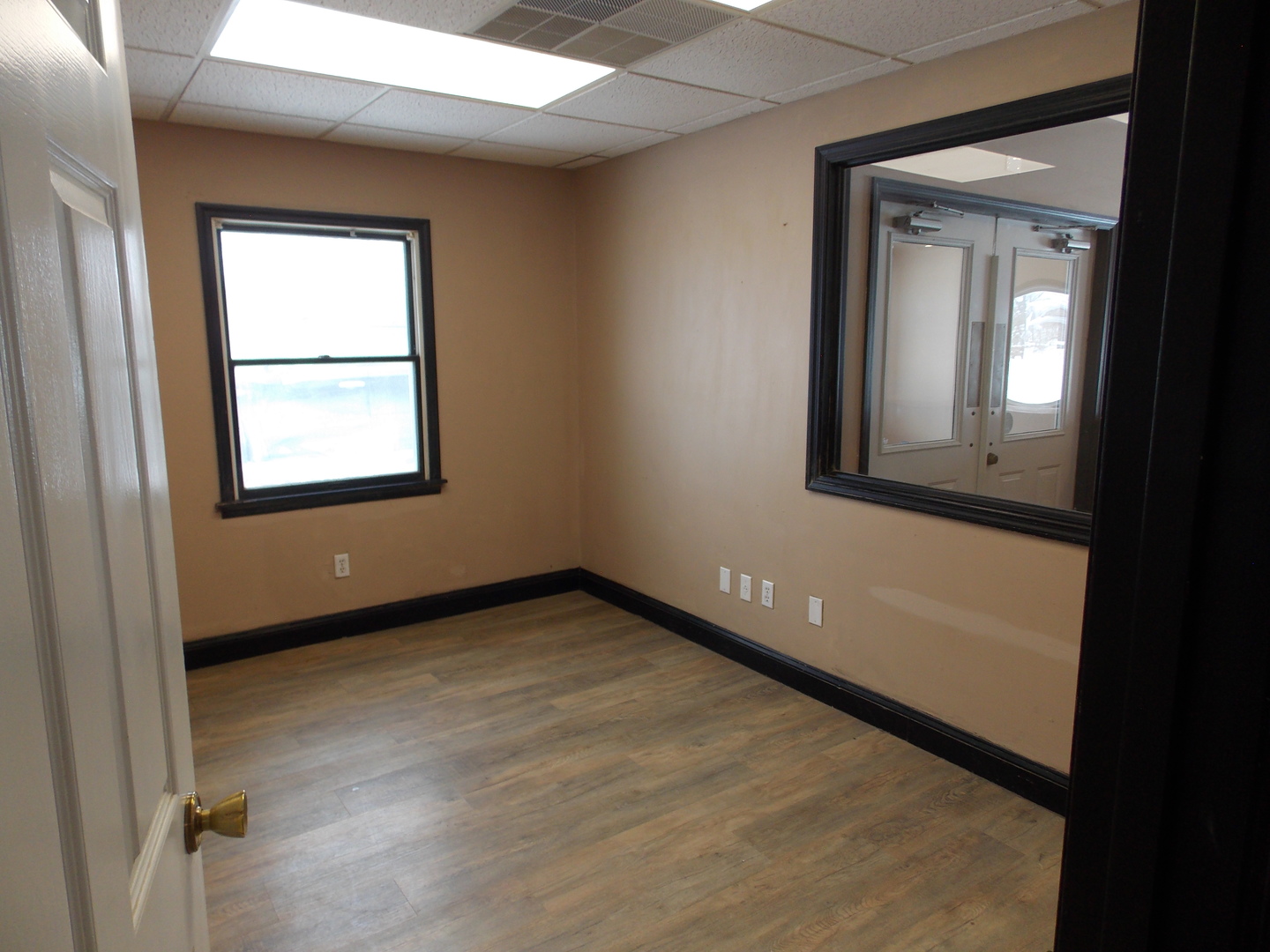 303 West Poplar Street Odin, IL 62870 - Photo 14 of 20 an empty room with a window