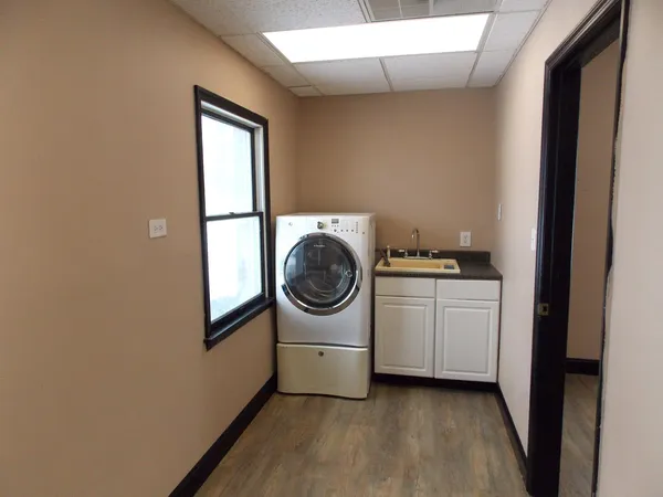 a utility room with dryer and washer