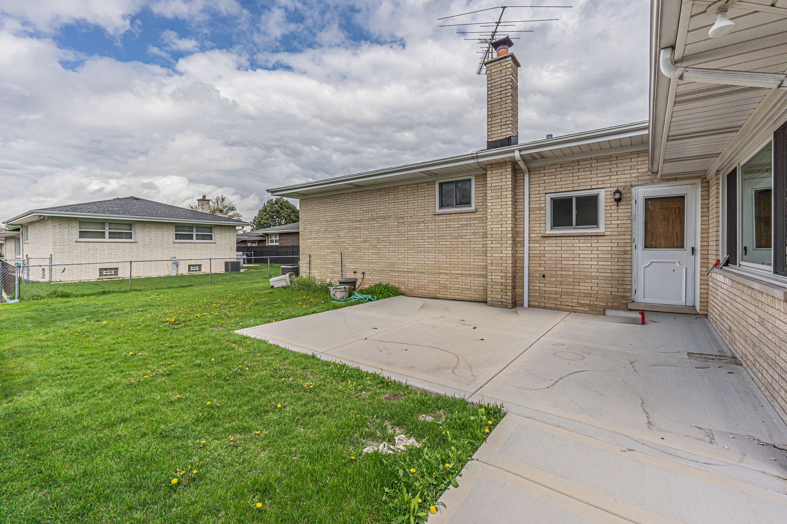 11020 Raleigh Street Westchester, IL 60154 - Photo 25 of 27 a front view of house with yard
