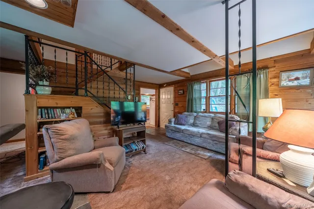 a outdoor living space with furniture and a potted plant