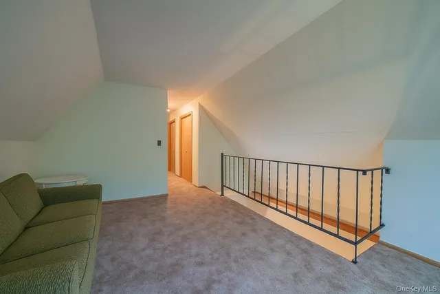 a view of a livingroom with furniture