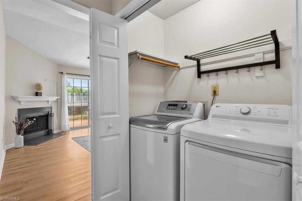 814 Guilford College Road, Unit 133 Greensboro, NC 27409 - Photo 14 of 18 Laundry room with shelving
