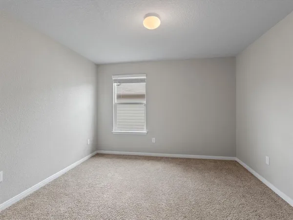 a bathroom with a double vanity sink mirror and shower