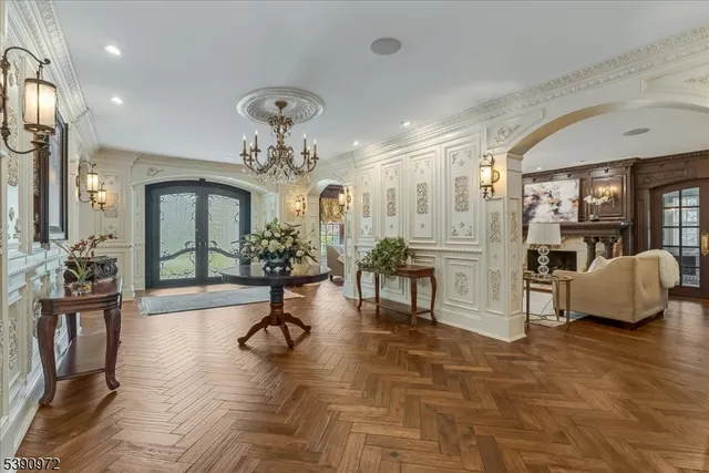 a view of a lobby with furniture and wooden floor