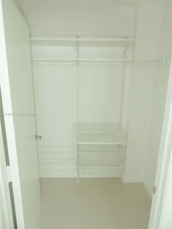 a view of a balcony next to a lake