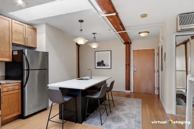 a view of a dining room with furniture
