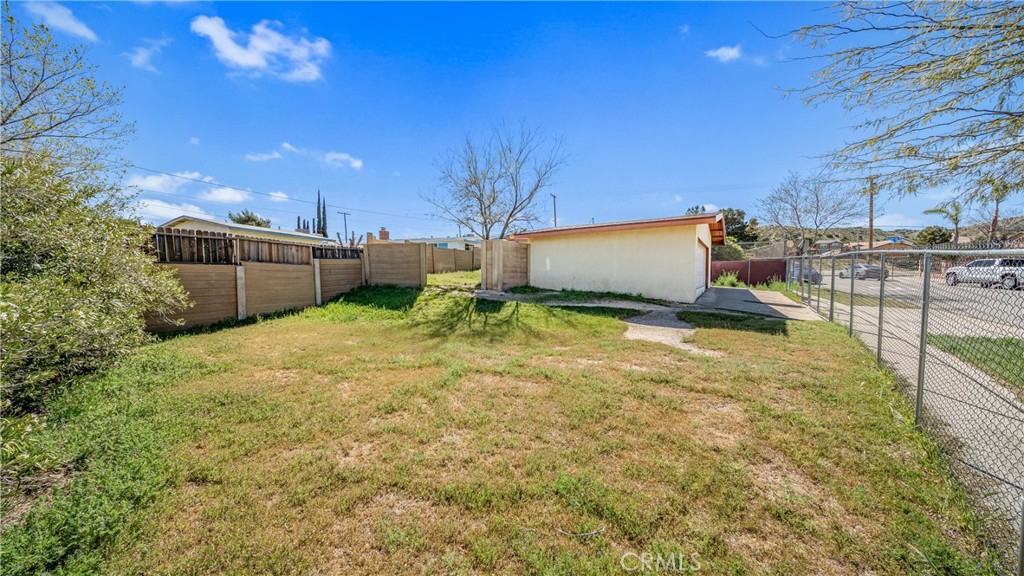 1549 Elizabeth Lake Road Palmdale, CA 93551 - Photo 17 of 27 a view of a backyard
