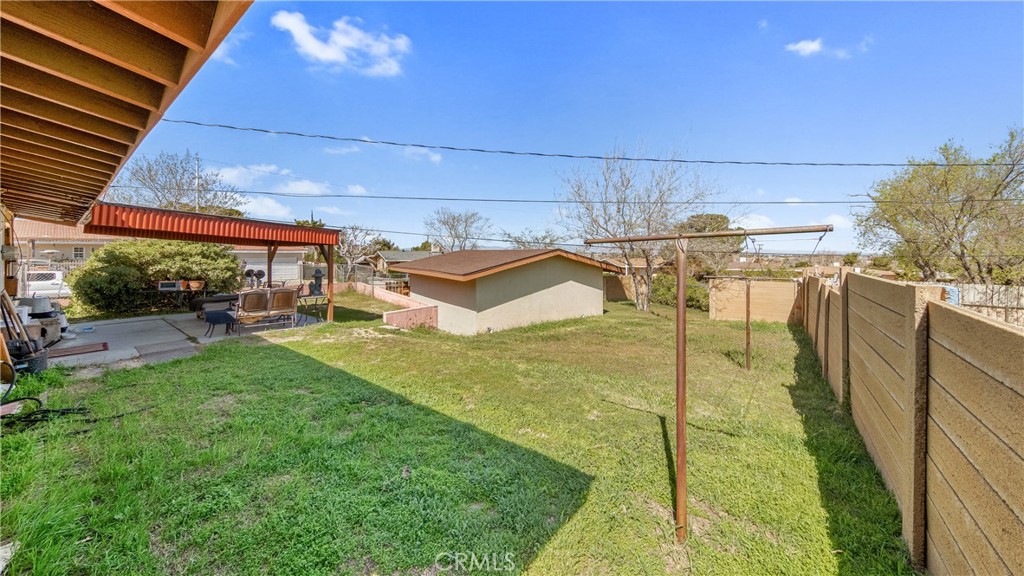 1549 Elizabeth Lake Road Palmdale, CA 93551 - Photo 18 of 27 a view of a backyard