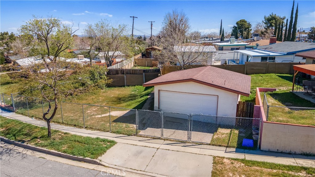 1549 Elizabeth Lake Road Palmdale, CA 93551 - Photo 20 of 27 a house view with a outdoor space