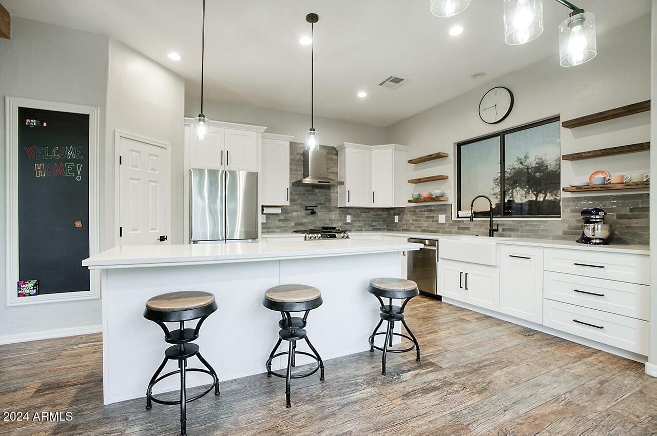 2540 West Tanya Road Phoenix, AZ 85086 - Photo 8 of 42 Kitchen with island and bar seating