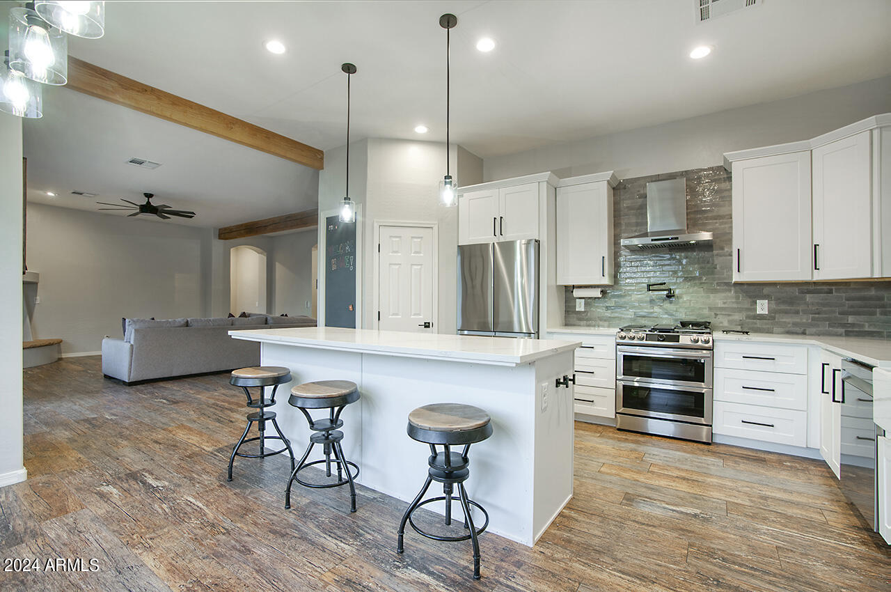 2540 West Tanya Road Phoenix, AZ 85086 - Photo 9 of 42 Kitchen with island and bar seating