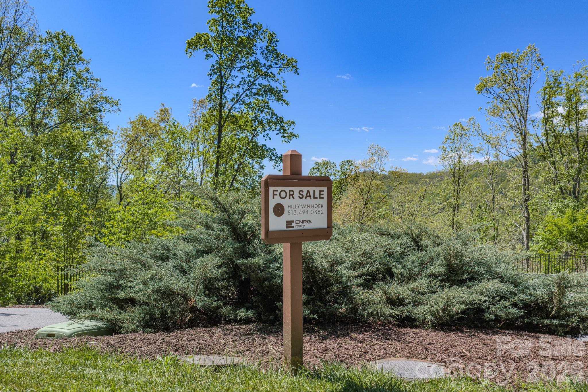 67 Clear Water Trail Road, Unit 511 Fairview, NC 28730 - Photo 11 of 12 a sign that is on the side of a road