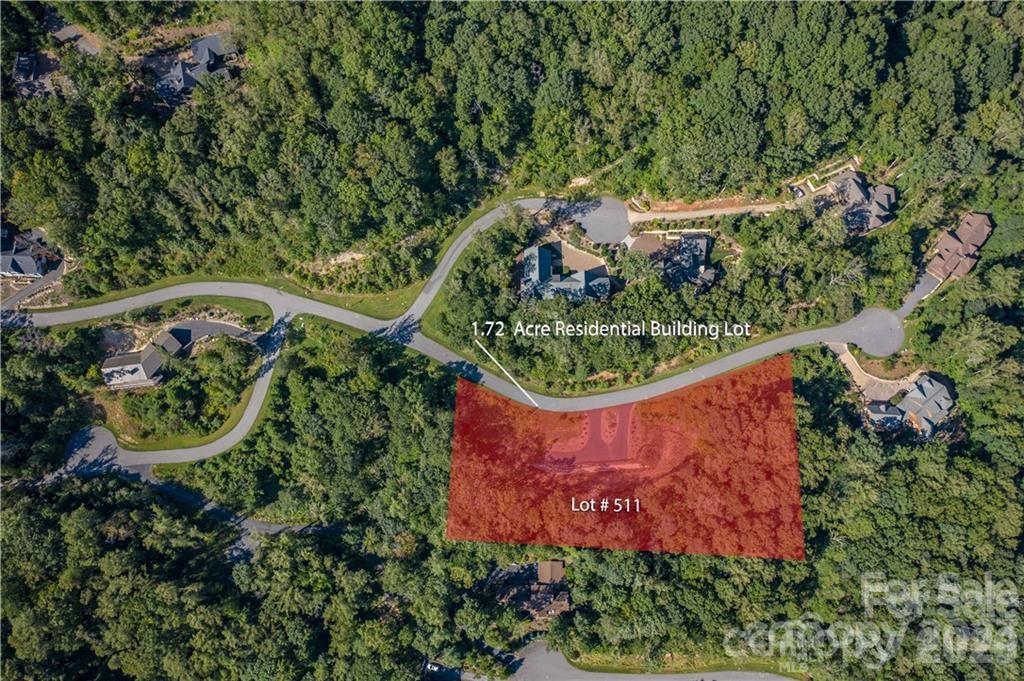 67 Clear Water Trail Road, Unit 511 Fairview, NC 28730 - Photo 12 of 12 an outdoor space with swimming pool and outdoor seating