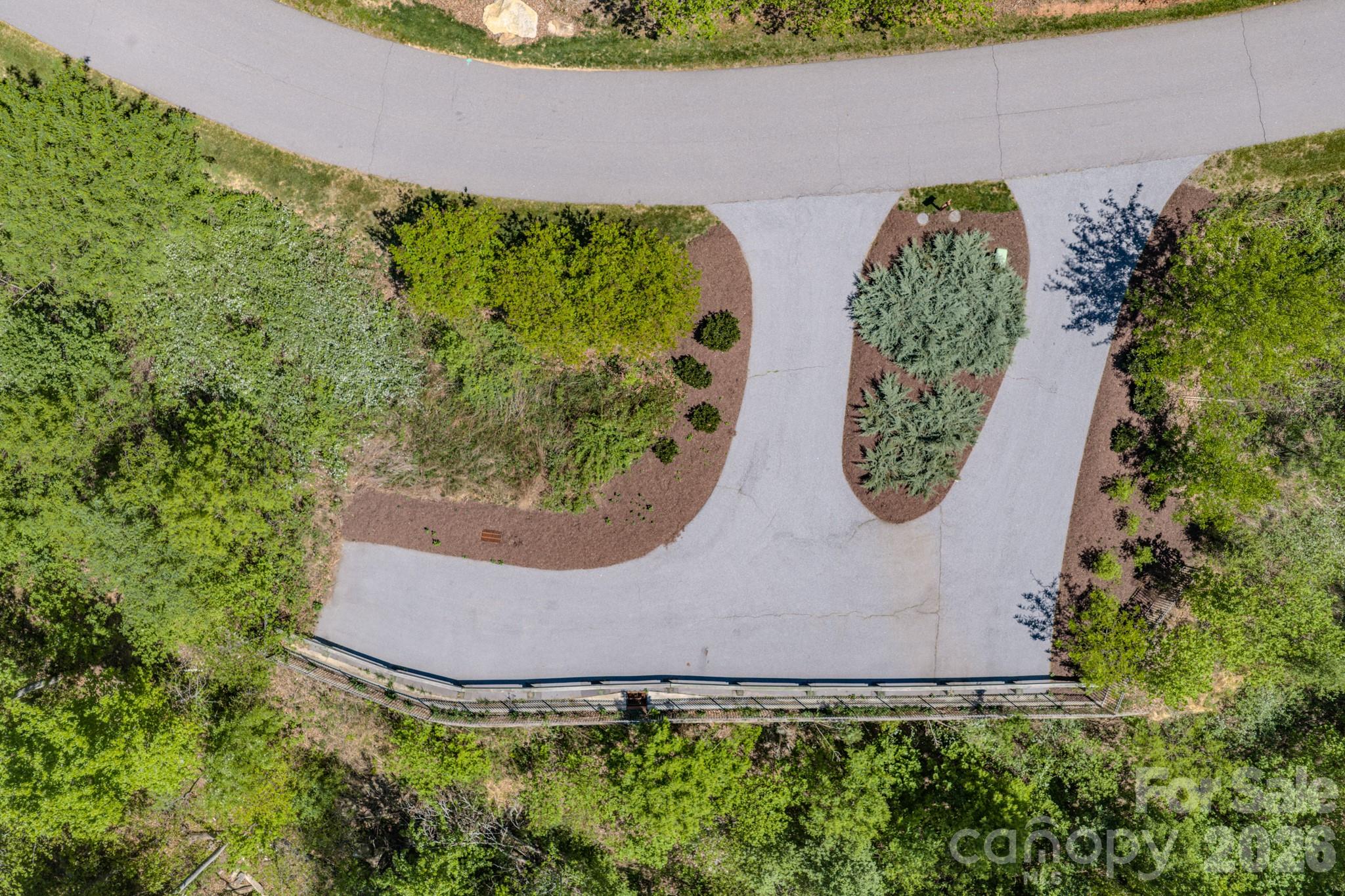 67 Clear Water Trail Road, Unit 511 Fairview, NC 28730 - Photo 7 of 12 an aerial view of a garden