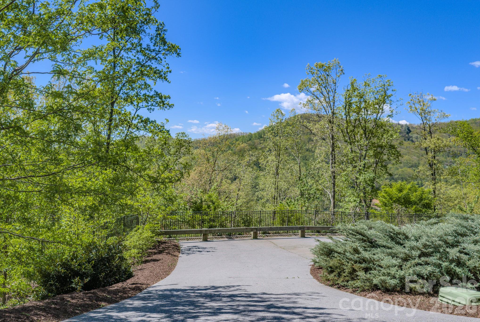 67 Clear Water Trail Road, Unit 511 Fairview, NC 28730 - Photo 10 of 12 a view of a house with a street