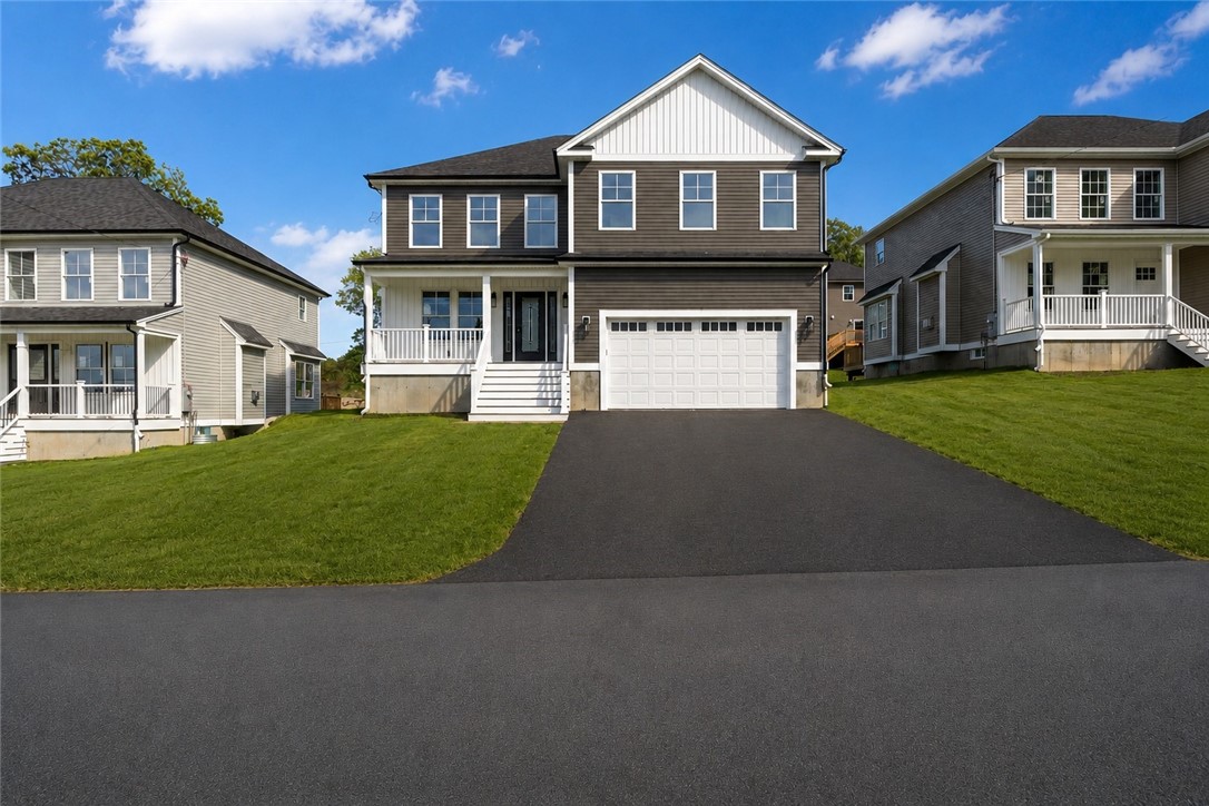188 St Louis Avenue Woonsocket, RI 02895 - Photo 1 of 30 Road was edited with AI