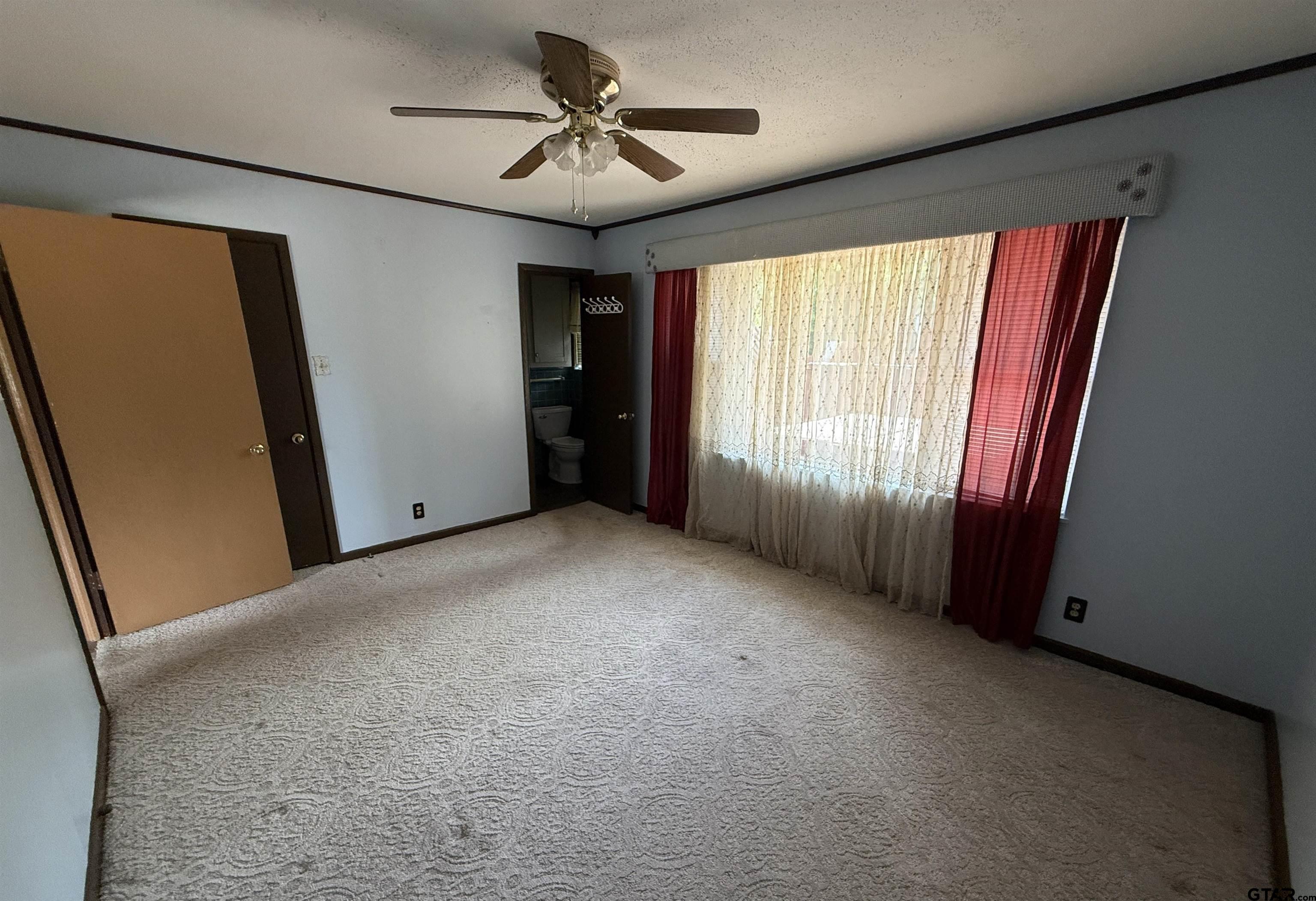 2015 East 5th Street Tyler, TX 75701 - Photo 17 of 32 a view of an empty room with a window