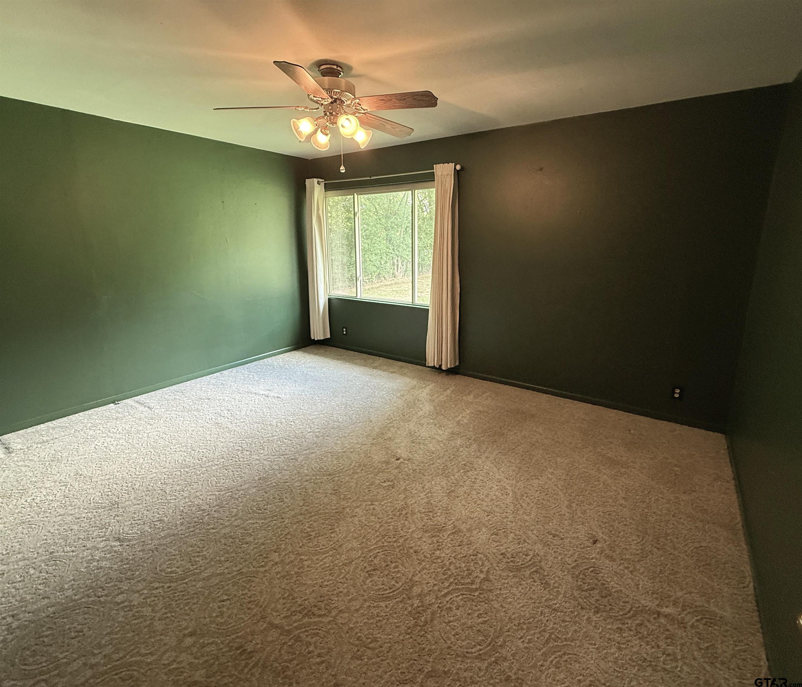 2015 East 5th Street Tyler, TX 75701 - Photo 22 of 32 an empty room with a window