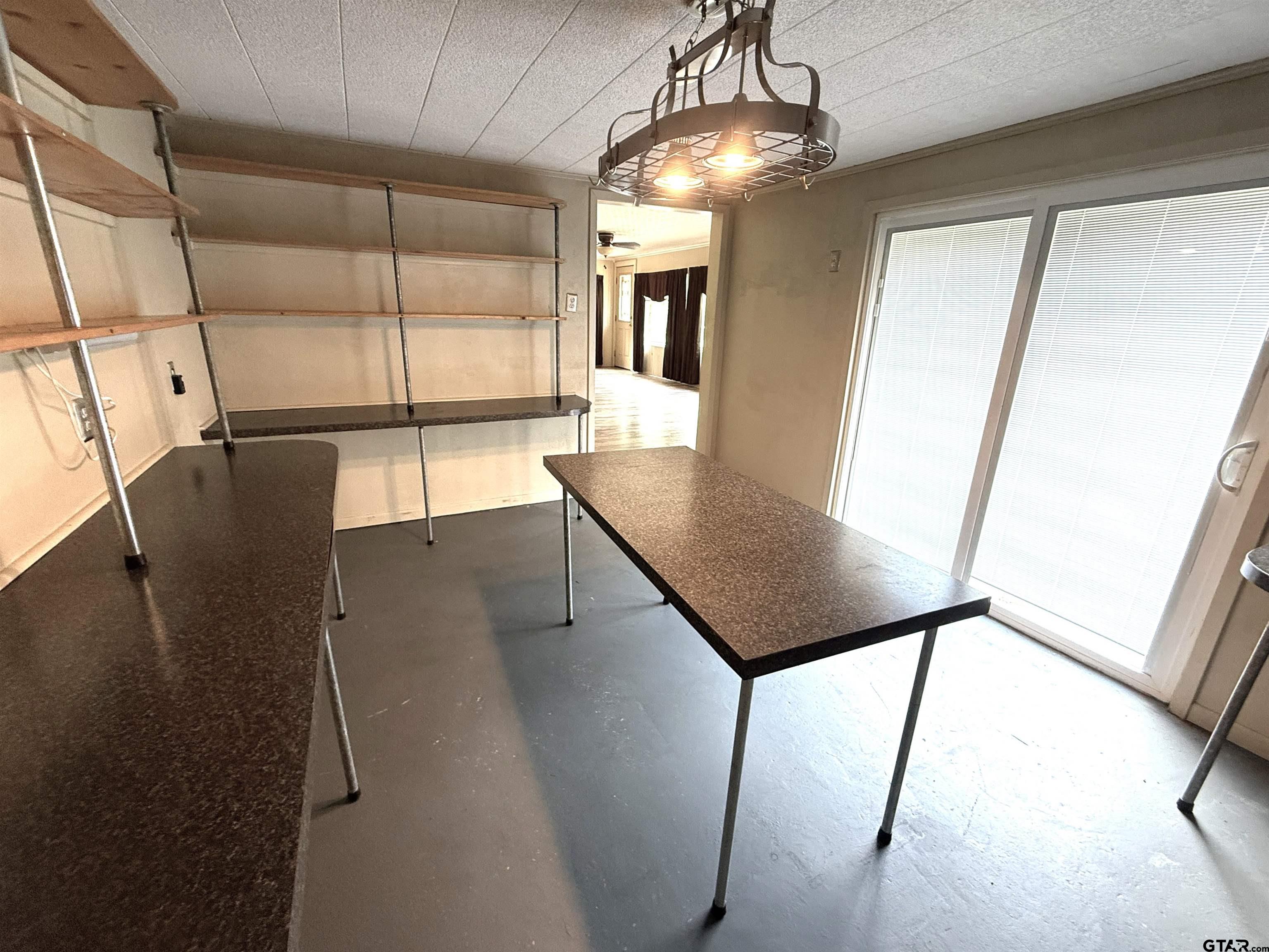2015 East 5th Street Tyler, TX 75701 - Photo 24 of 32 a view of a livingroom with furniture and window