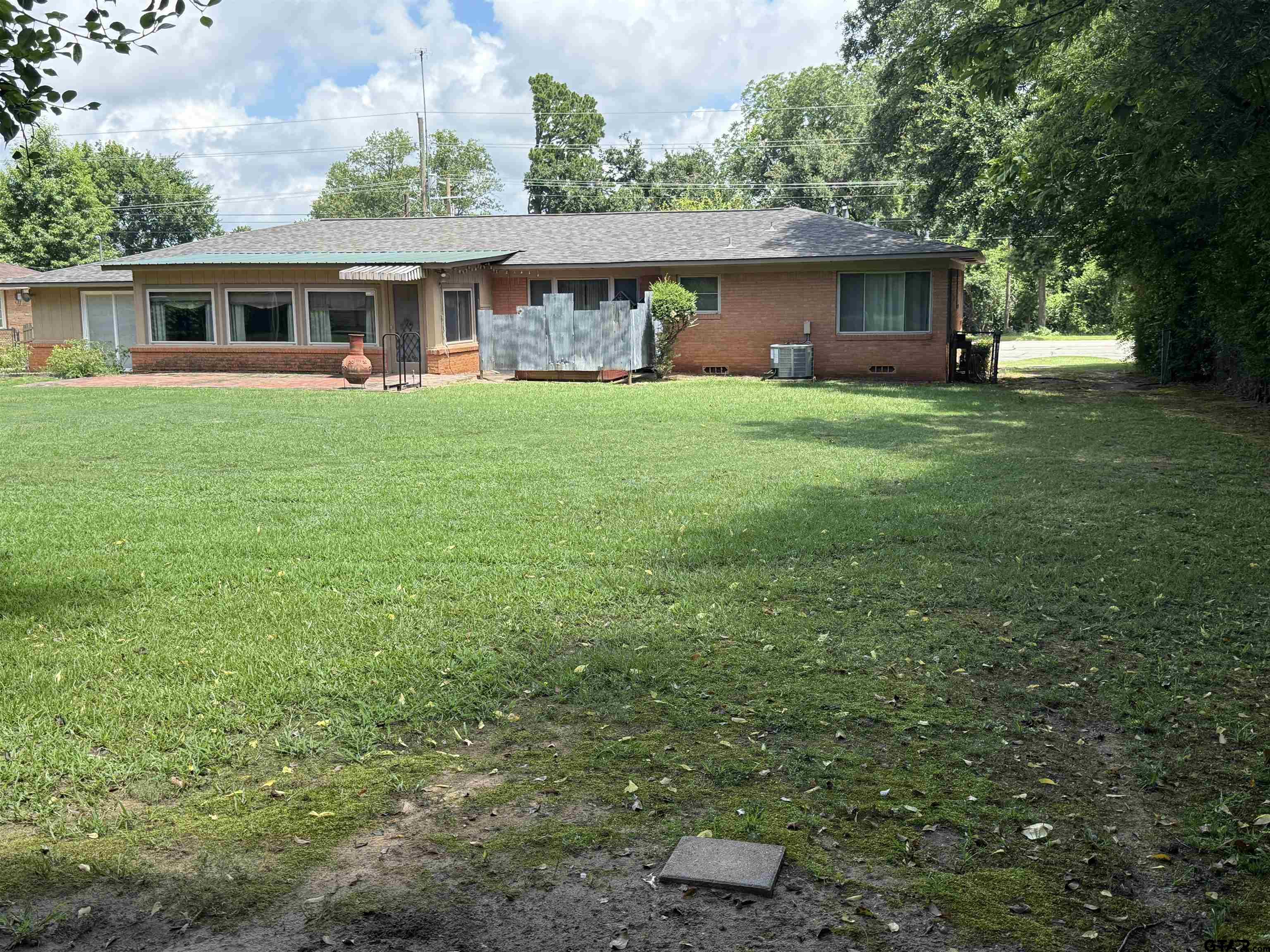 2015 East 5th Street Tyler, TX 75701 - Photo 29 of 32 a view of house with yard and green space