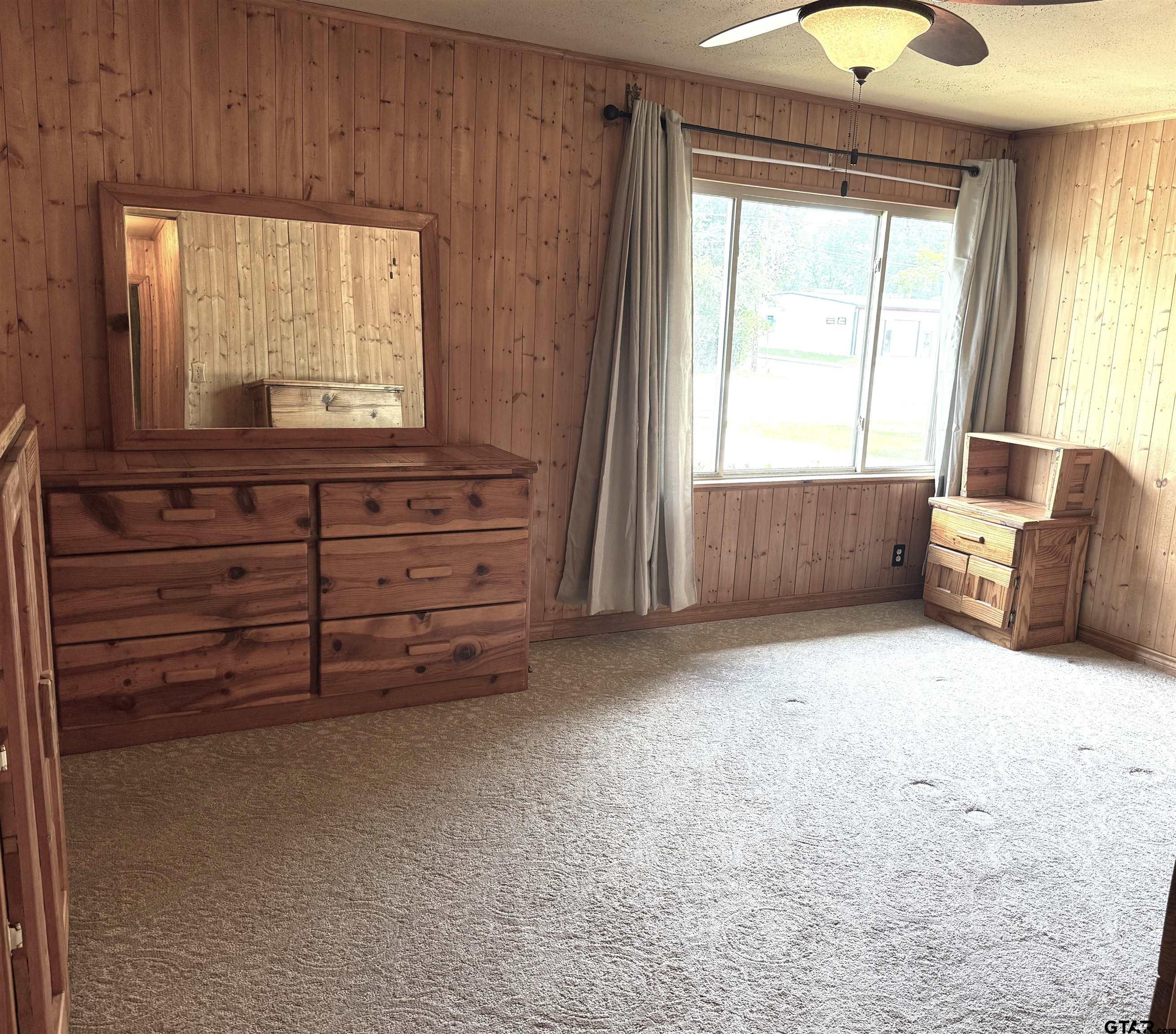 2015 East 5th Street Tyler, TX 75701 - Photo 10 of 32 a view of room with window and cabinet