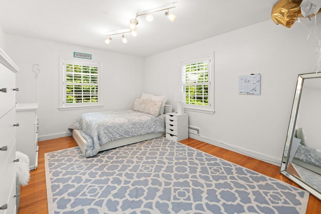 20 Cliff Road Wellesley, MA 02481 - Photo 11 of 21 a bedroom with a bed and a window