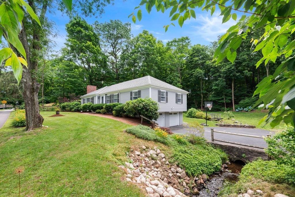 20 Cliff Road Wellesley, MA 02481 - Photo 20 of 21 a house view with a garden space