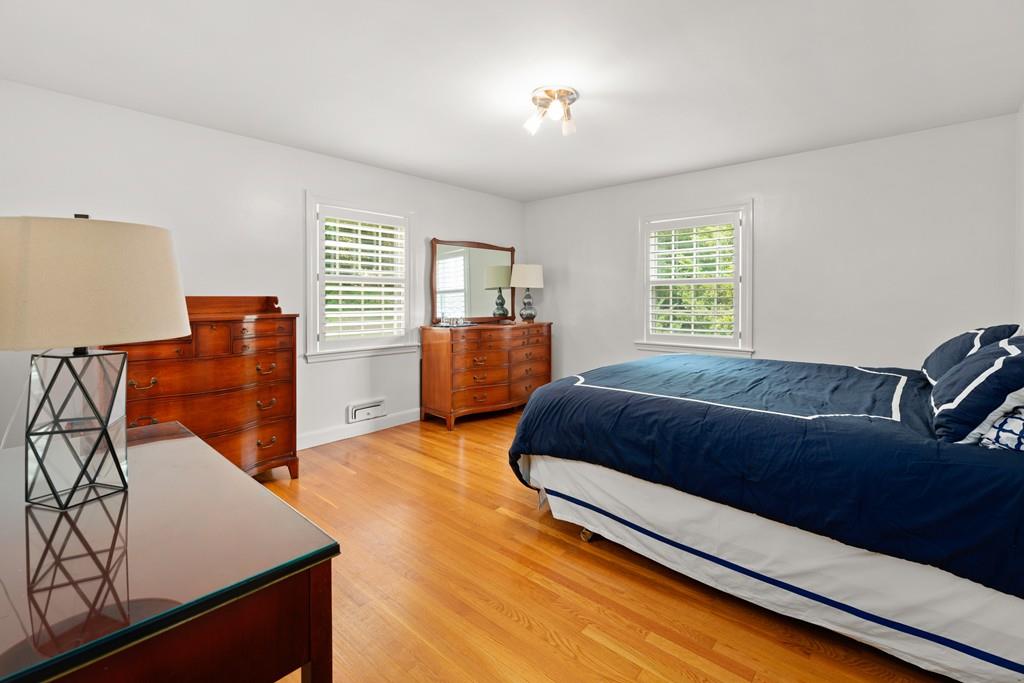 20 Cliff Road Wellesley, MA 02481 - Photo 9 of 21 a bedroom with a bed and window