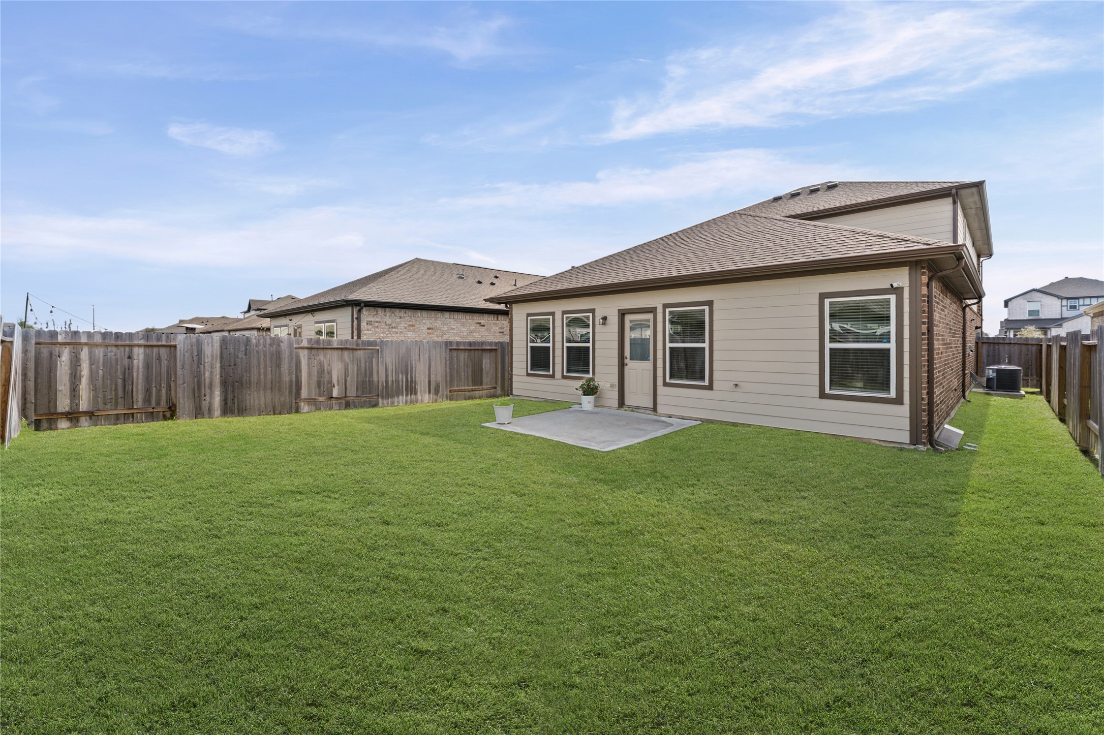23326 Spring Genesis Lane Katy, TX 77493 - Photo 29 of 32 a view of a house with a backyard