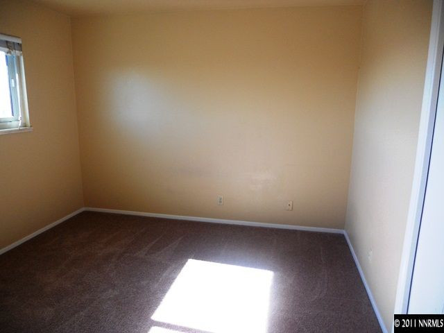 1385 Peavine Road Reno, NV 89503 - Photo 8 of 13 an empty room with a window