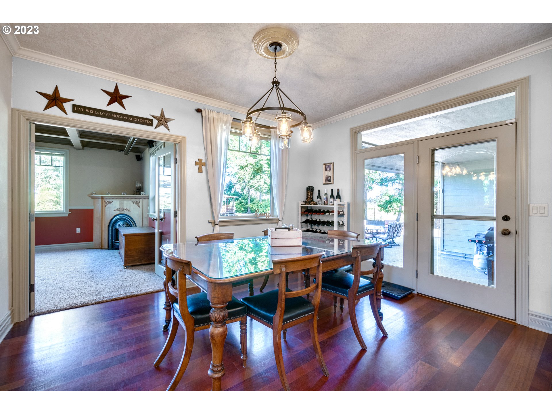 1675 South Boones Ferry Road Woodburn, OR 97071 - Photo 13 of 45 a dining room with furniture window and wooden floor